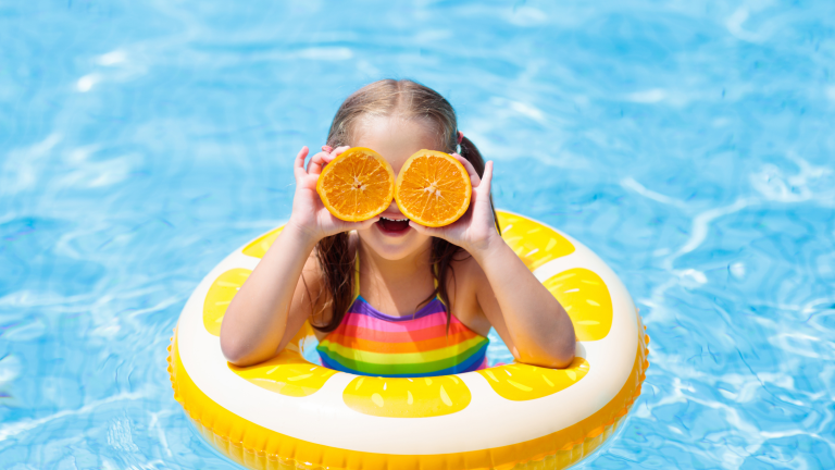 Young girl in swimming pool