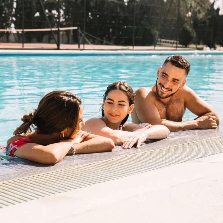 family in pool